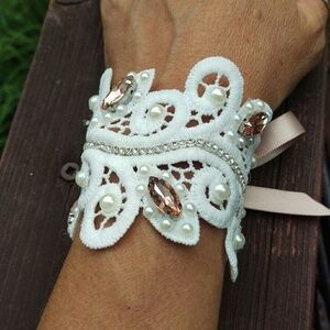 White lace cuff bracelet with rhinestone brooches